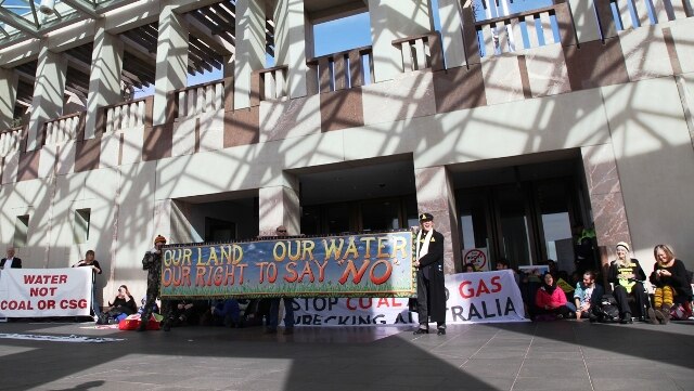 Angry Hunter residents and farmers are protesting outside Federal Parliament today.