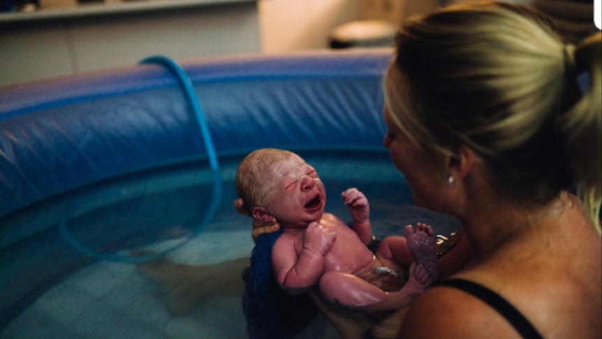 Baby born at home in inflatable pool