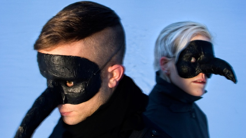 The Knife's Karin Dreijer Andersson and Olof Andersson wearing masks with long noses