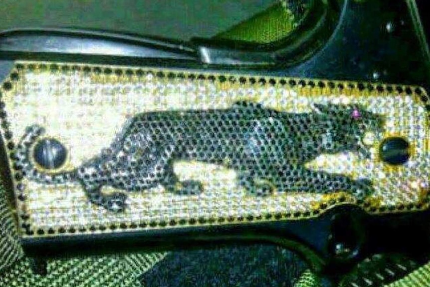 A close-up of the diamond encrusted pistol grip on the handgun that once belonged to Joaquin "El Chapo" Guzman.