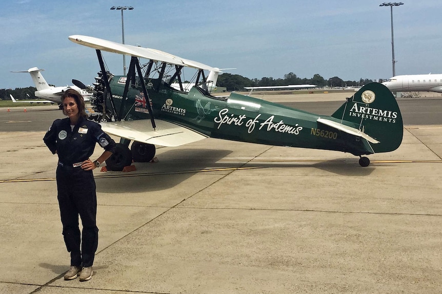 British pilot Tracey Curtis-Taylor with biplane Spirit of Artemis