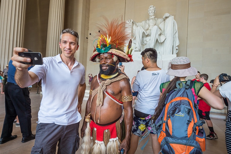 Huli Chief takes a selfie at the Abraham Lincoln statue in Washington