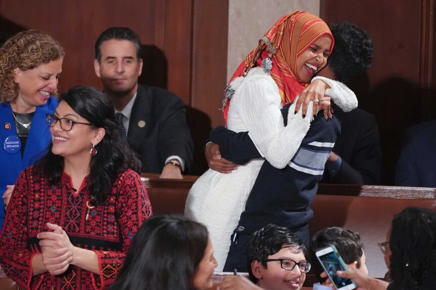 Rep. Ilhan Omar embraces son