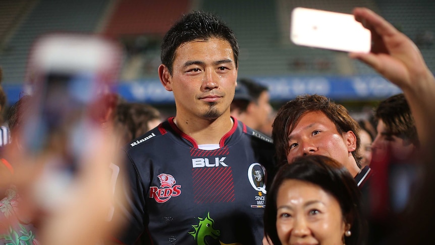 Fan favourite ... Ayumu Goromaru poses for photos at Ballymore on Friday night