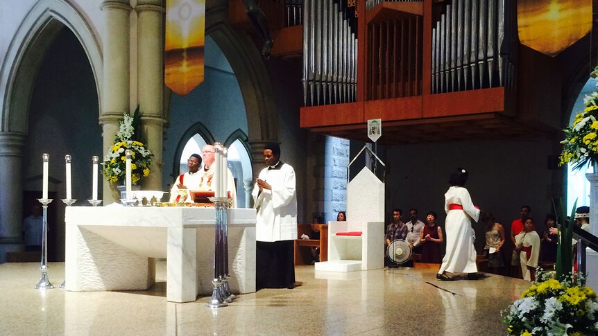 Catholic Archbishop Mark Coleridge leads a service at the Cathedral of St Stephen