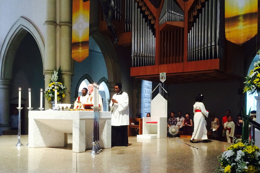 Catholic Archbishop Mark Coleridge leads a service at the Cathedral of St Stephen