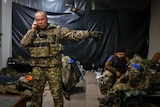 Commander of the Ukrainian army, Col. Gen. Oleksandr Syrskyi, gives instructions in a shelter in Soledar.