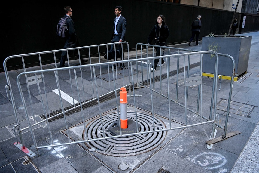 A three-pronged barrier protecting the footpath