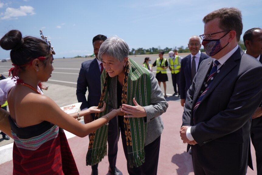 Foreign Minister Penny Wong is greeted after arriving in East Timor's capital Dili.  