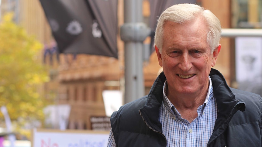 John Hewson speaks to reporters at the science march in the sydney cbd