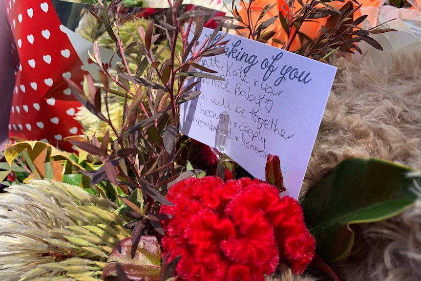 Written tribute at scene of fatal crash left for couple Katherine Leadbetter, who was pregnant, and Matthew Field.