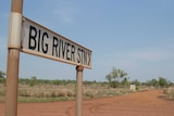 a road sign for Big River Station