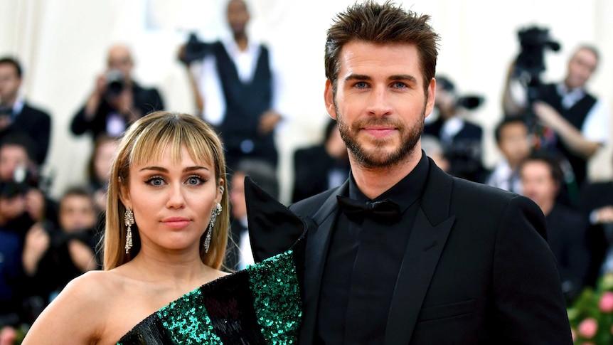 Miley Cyrus and Liam Hemsworth at a benefit gala