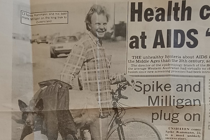 Newspaper article with photo of smiling man on bike with dog on the back. Article headline, Spike and Milligan plug on.
