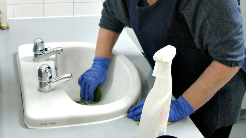 Cleaner works in bathroom