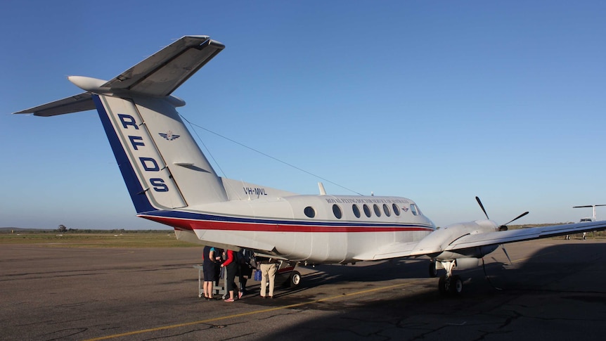 A Royal Flying Doctor Service aircraft is packed for a health clinic in Broken Hill.