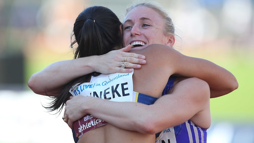 Show of class ... Sally Pearson (R) celebrates with Michelle Jenneke after winning the 100 metres hurdles final