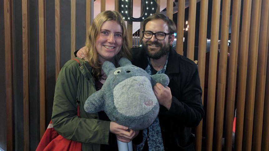 Peter Howard and Ruth Richards holding a Totoro soft toy at Hoyts Cinema at Melbourne Central. August 24, 2017.
