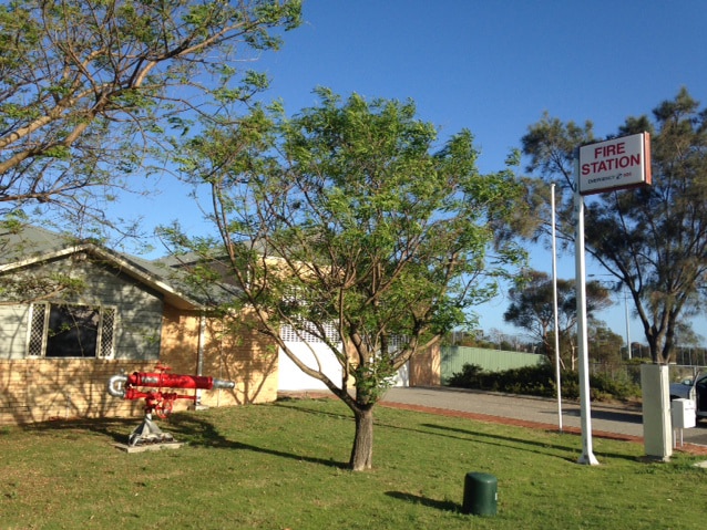 A sign saying fire station stands outside the Success fire station south of Perth