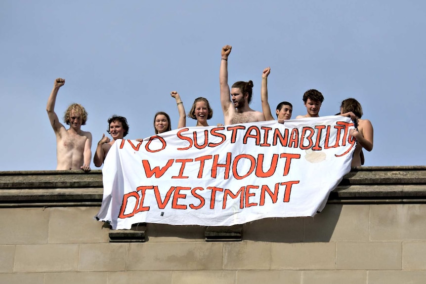 Students strip off to protest against investing in fossil fuels