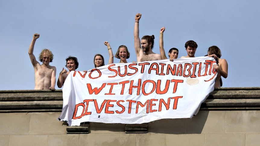 Students strip off to protest against investing in fossil fuels