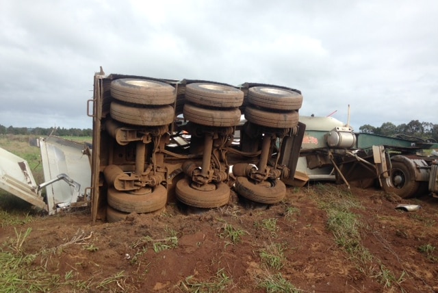 Rear view of truck's wheels at train crash site