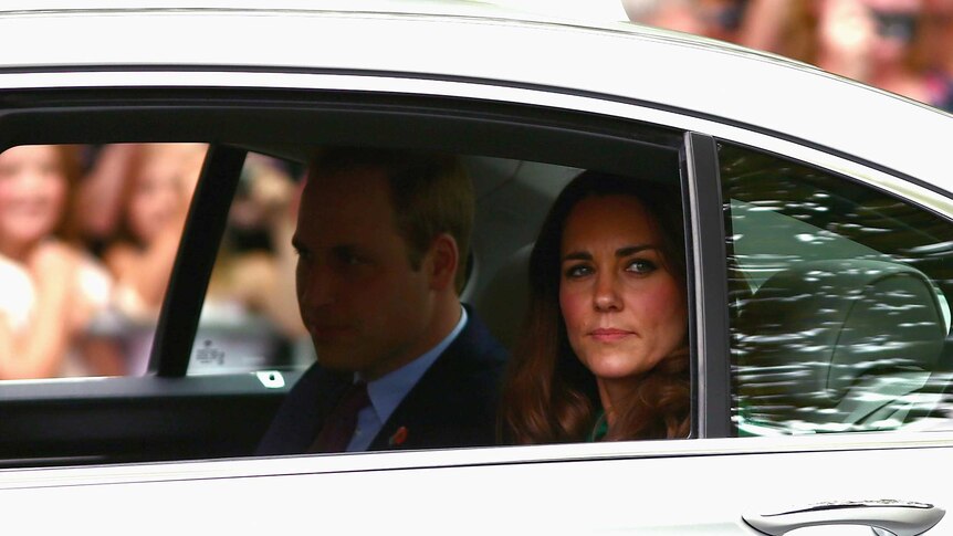 Prince William and his wife Catherine arrive at the Cambridge Town Hall.