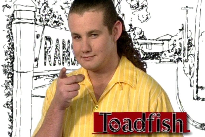 A still from the opening credits of Neighbours from the 90s, showing character Toadfish.
