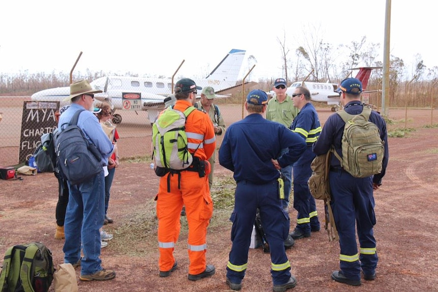 Emergency workers are briefed in Galiwinku following Tropical Cyclone Lam