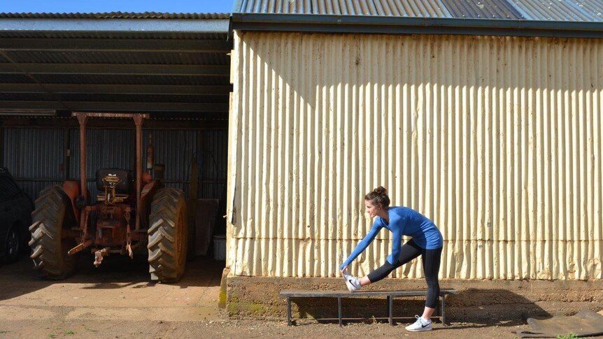 JJ Pullinger limbers up before an Active Farmers class at Hagley