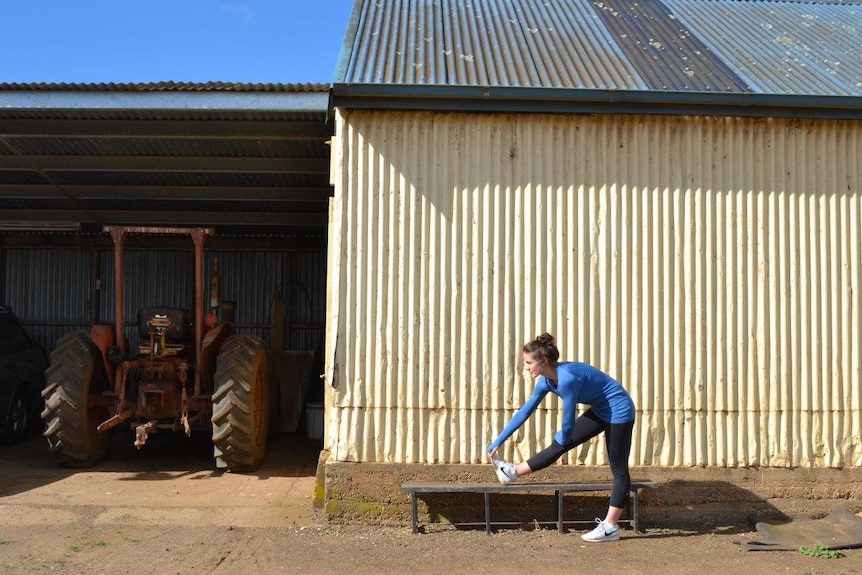 JJ Pullinger limbers up before an Active Farmers class at Hagley