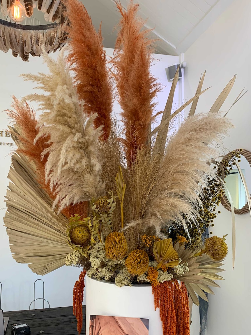 A floral display featuring pampas grass in a shop in Byron Bay