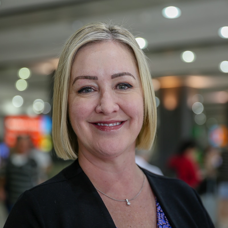 Melbourne Airport’s chief of landsite access Lorie Argus smiles at the camera.