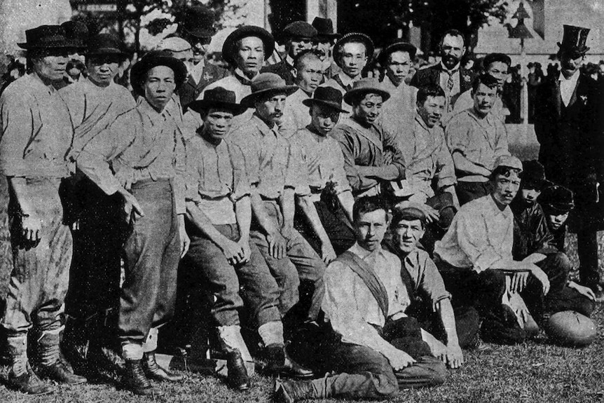 A late 1800s black and white photo of a Chinese-Australian football team