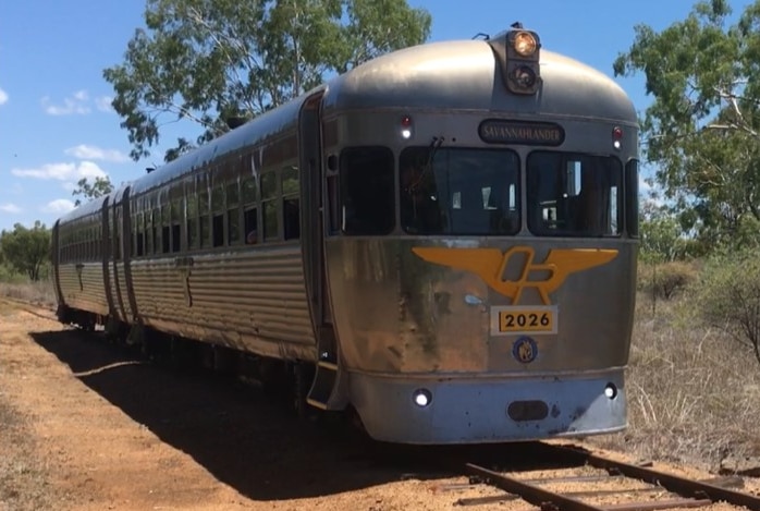 The vintage two-carriage 'Savannahlander' rail motor is on the track near Mt Surprise in far north Queensland.