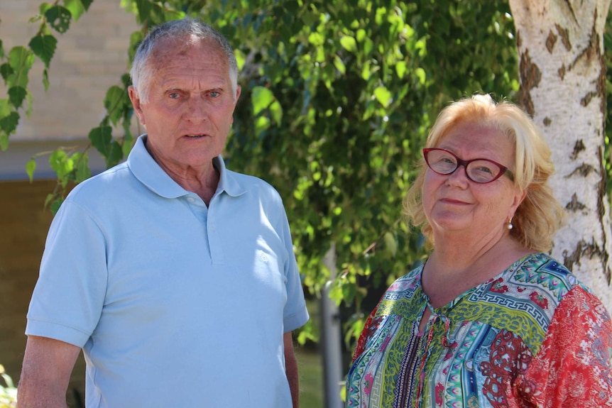 Michael and Judy Bos outside their solar powered home at Pearcedale, in Victoria.