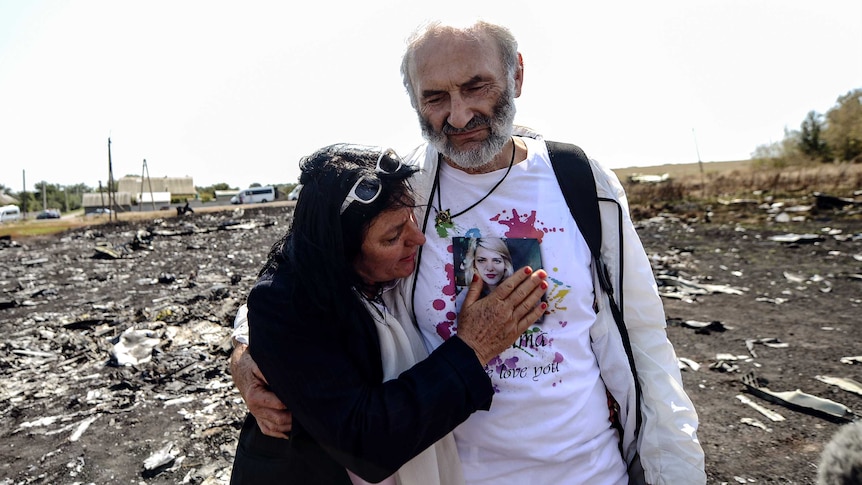 Jerzy Dyczynski and Angela Rudhart-Dyczynski at MH17 crash site
