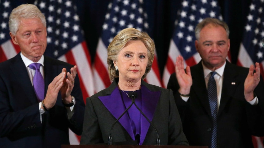Hillary Clinton appears sad and defeated as she addresses an audience.