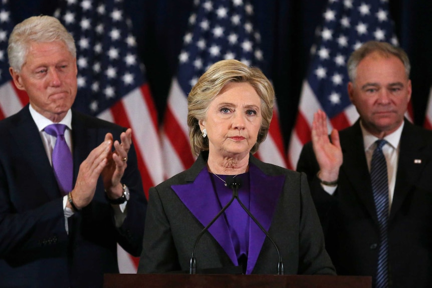 Hillary Clinton appears sad and defeated as she addresses an audience.