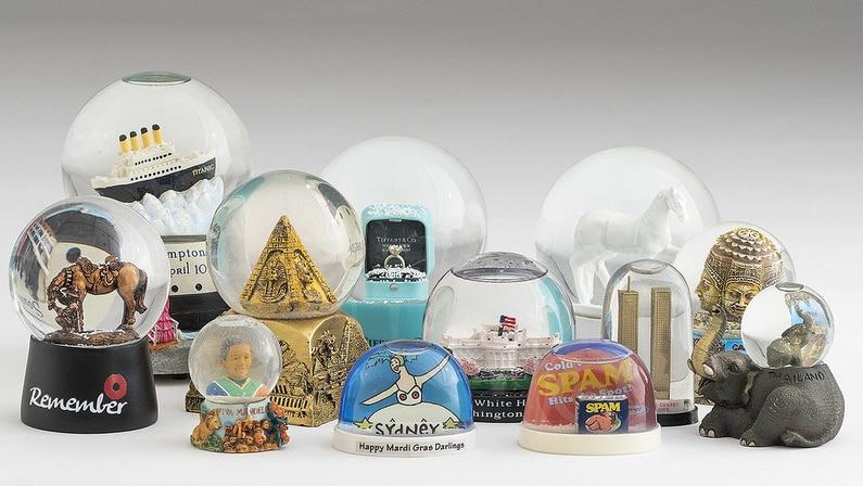 Some of the 500 snow domes on display in the All Shook Up exhibition at the Canberra Museum and Gallery