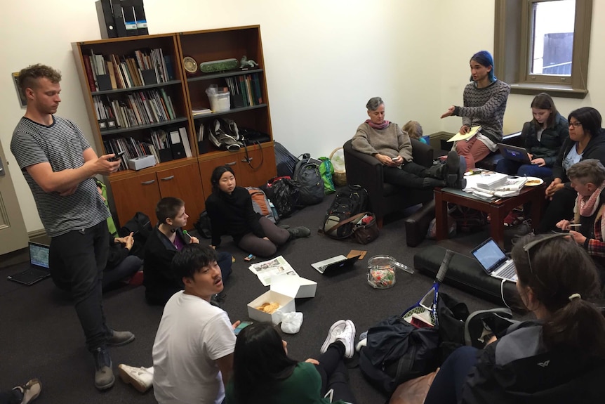 Students staging a sit-in over proposed cuts to their university's arts program.