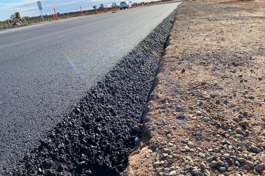 A large hole in a road