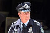 Queensland Police Sergeant Gary Hamrey, who was shot in the face, arrives at the Supreme Court in Brisbane
