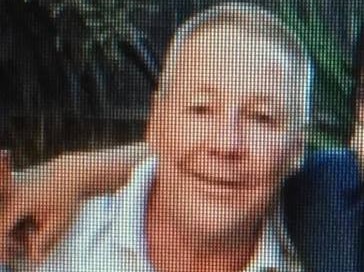Photo of Steven Groat with short grey hair and a light blue polo shirt.