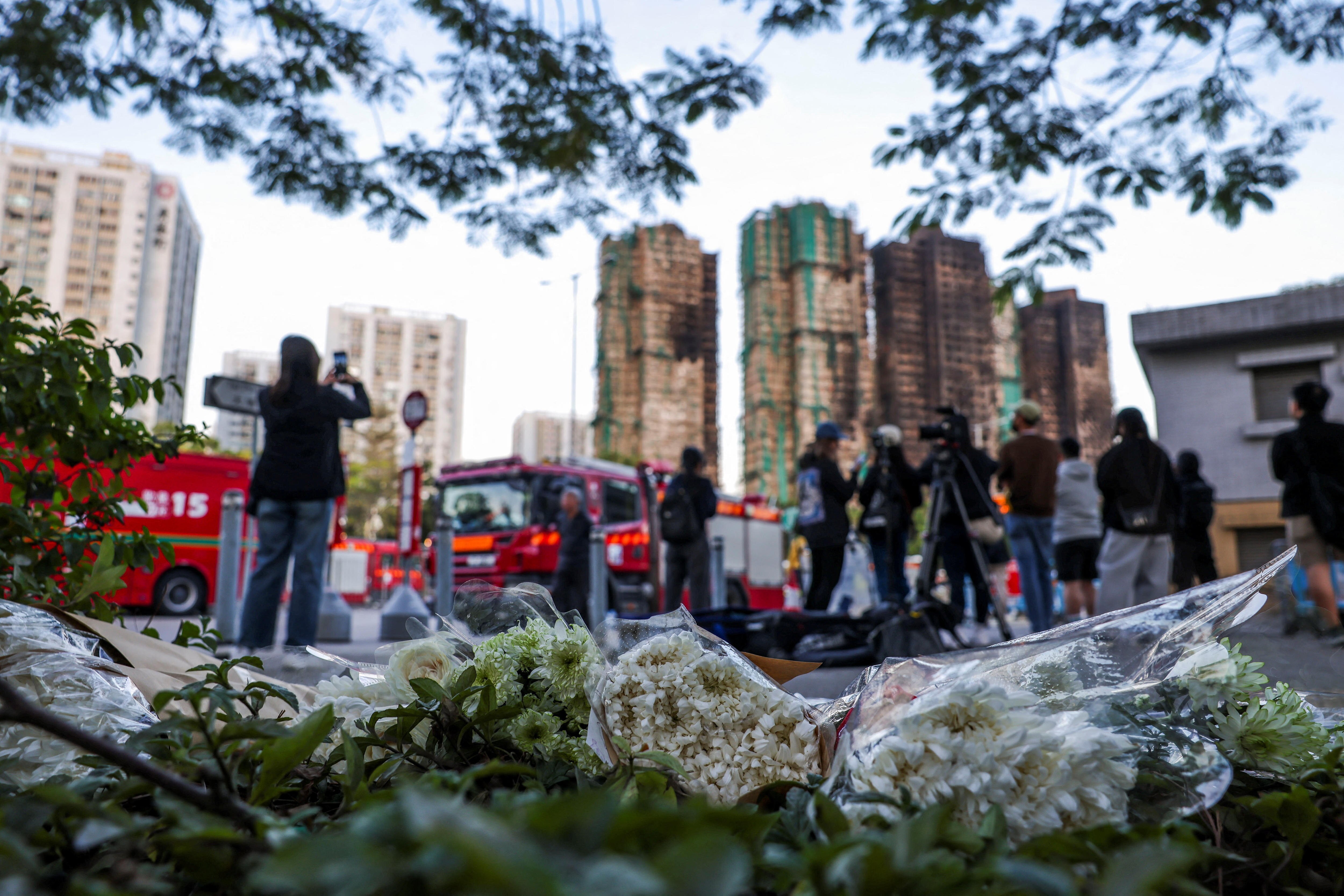 Hong Kong begins three days of mourning after apartment towers fire - ABC  News