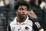Brisbane Broncos player Ezra Mam puts his hand on his hip during a NRL round one game in Las Vegas.