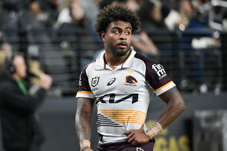 Brisbane Broncos player Ezra Mam puts his hand on his hip during a NRL round one game in Las Vegas.