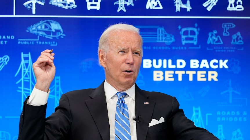 President Joe Biden speaks during a virtual meeting 
