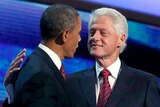 Barack Obama comes on stage to thank Bill Clinton after convention speech