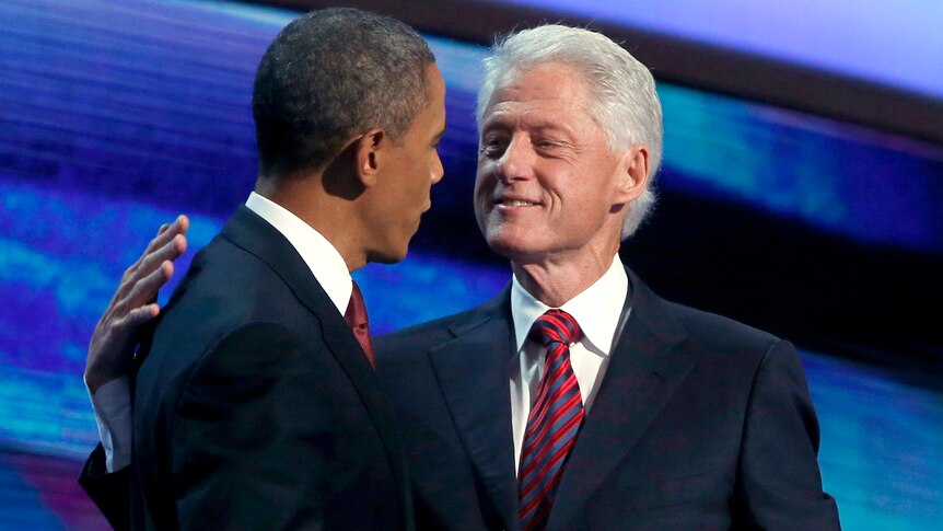 Barack Obama comes on stage to thank Bill Clinton after convention speech